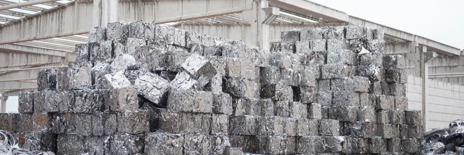 Bales of compressed recycled aluminum.
